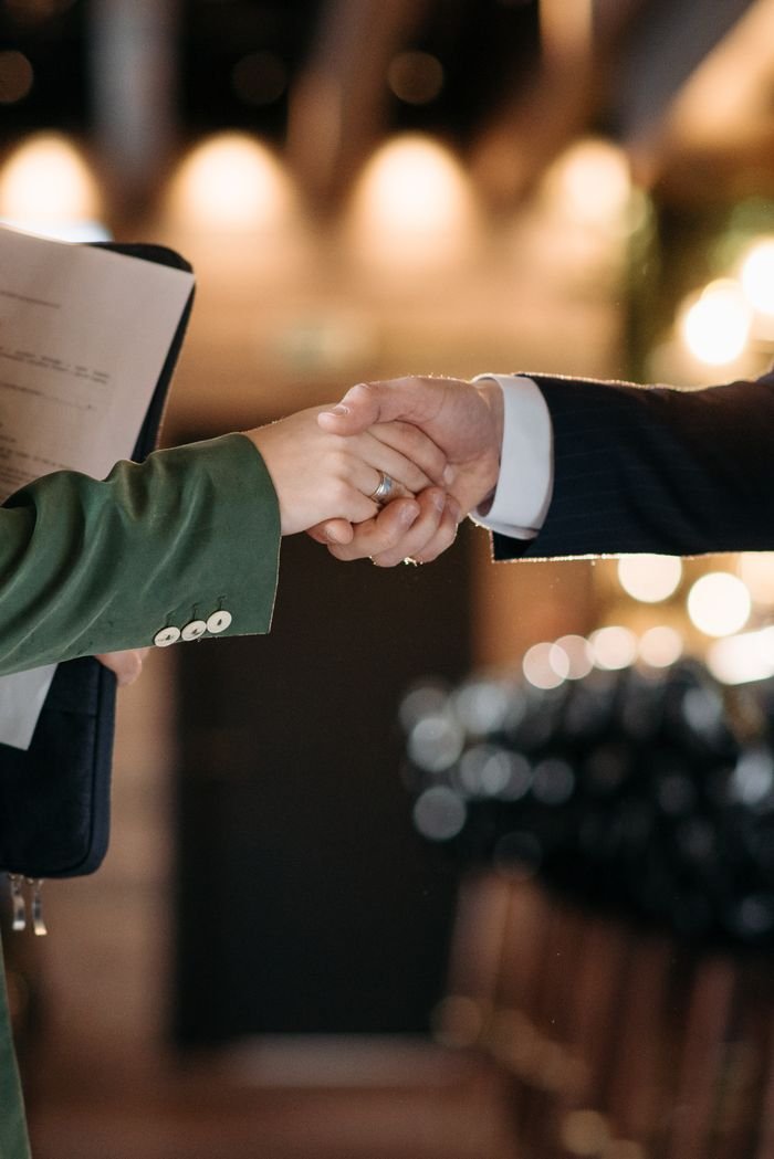 Mastering the First Impression: Your intriguing post title goes here Close-up of two professionals shaking hands, symbolizing a successful partnership agreement.